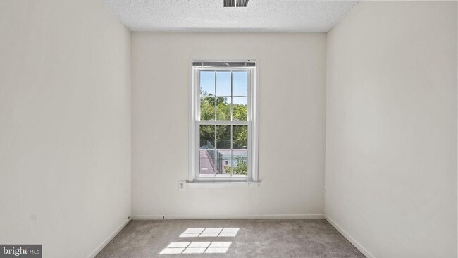 Building Photo - This stunning 3-bedroom, 2-bathroom interior townhome is sure to impress.