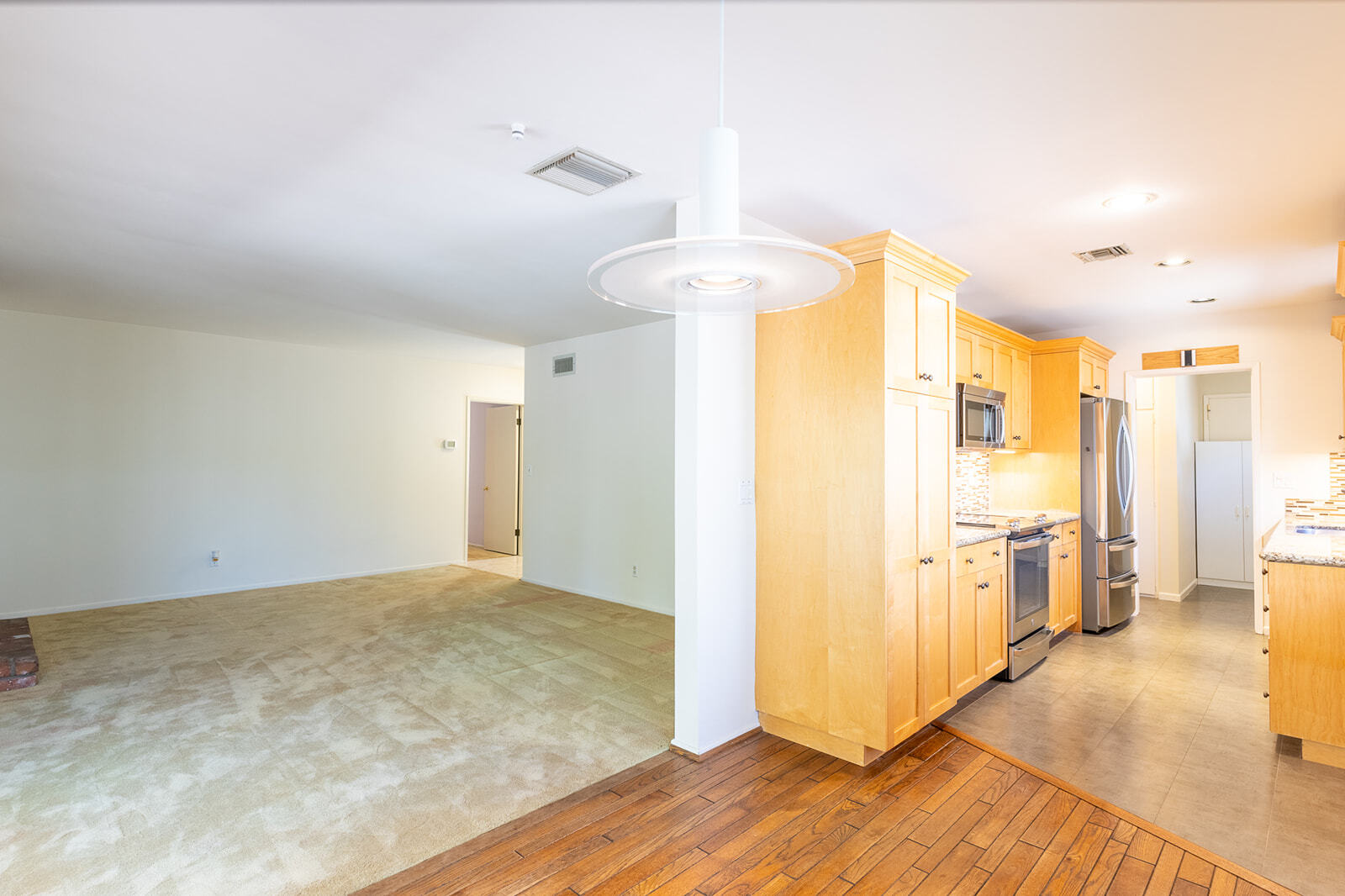 Seemless entry from living room to kitchen - 7246 Hatillo Ave