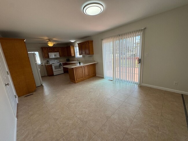 Building Photo - 4 Bedrooms, Big Yard & Top Schools – Don’t...