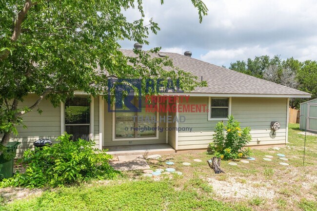 Building Photo - Well-Maintained Home with Large Yard and Storage Shed