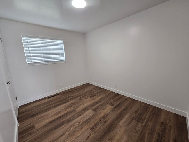 Building Photo - Remodeled 4 Bed, 2 Bath with Double Kitchen & Covered Carport