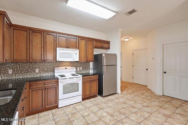 Building Photo - 409 Sand Stone Pl