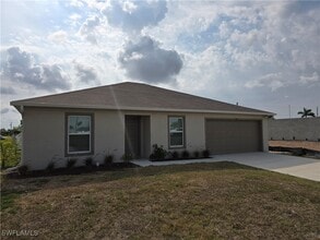 Building Photo - 120 NW 25th Ave