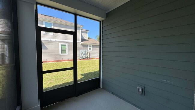 Building Photo - 2/2.5 Townhome in Prestwick – Garage & Screened Patio