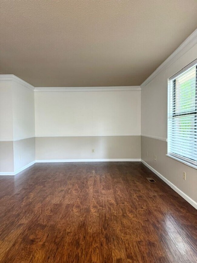 Building Photo - 2 Bedroom 1 Bath Duplex with garage/basement, side porch, and carport.