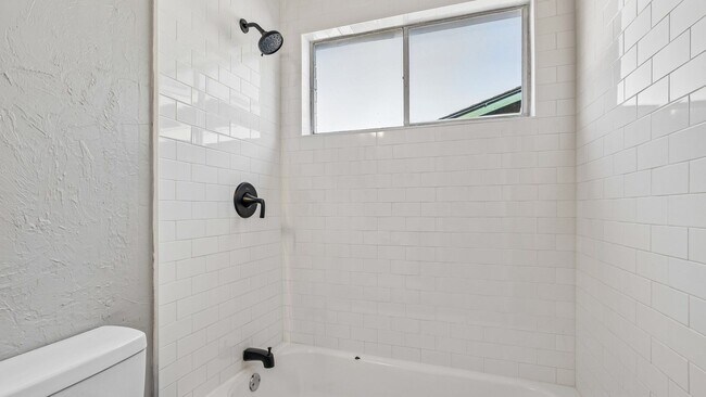 Building Photo - Charming 3 Bedroom Home +BONUS Room with Spacious Backyard