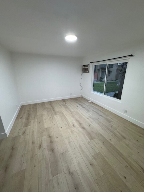 Building Photo - 8402 Larson Ave