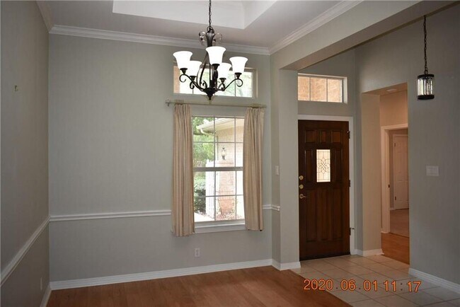 Building Photo - 10016 Liriope Cove