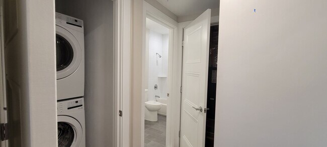 Building Photo - Large 2bd/2bath with Garage parking! Steps to Commuter Rail!