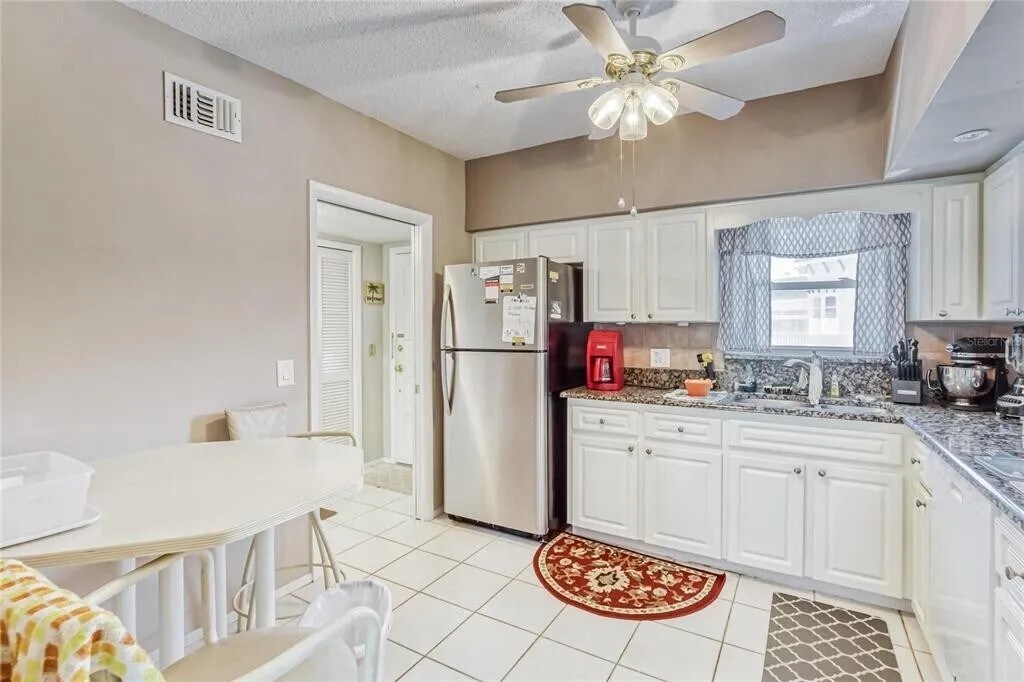 Kitchen is equipped with refrigerator, ice maker, stove, oven, microwave, dishwasher - 2460 Franciscan Dr