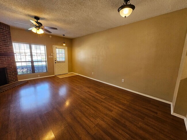 Building Photo - Stunning two-level, two-bedroom, one-and-a-half-bathroom townhome