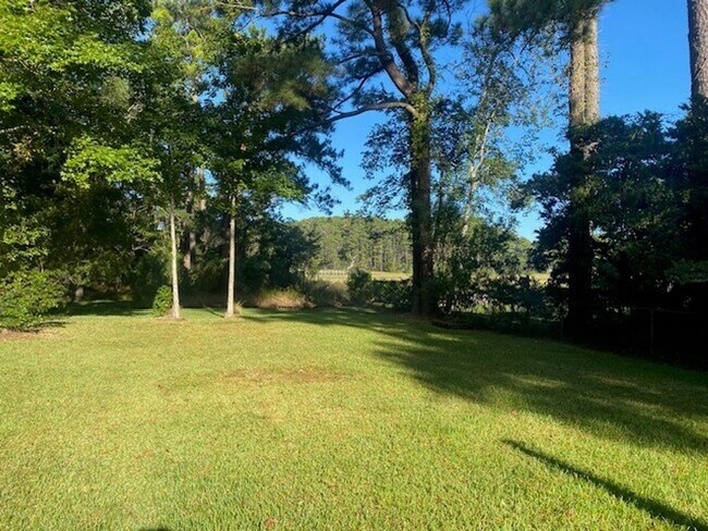 Building Photo - Beautiful Waterfront 4-Bedroom Home in Pirates Cove!