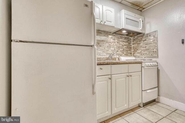 Building Photo - 1208 N Calvert St