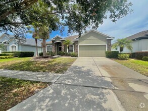 Building Photo - Spacious 4-Bed, 3-Bath Home in Guard-Gated...