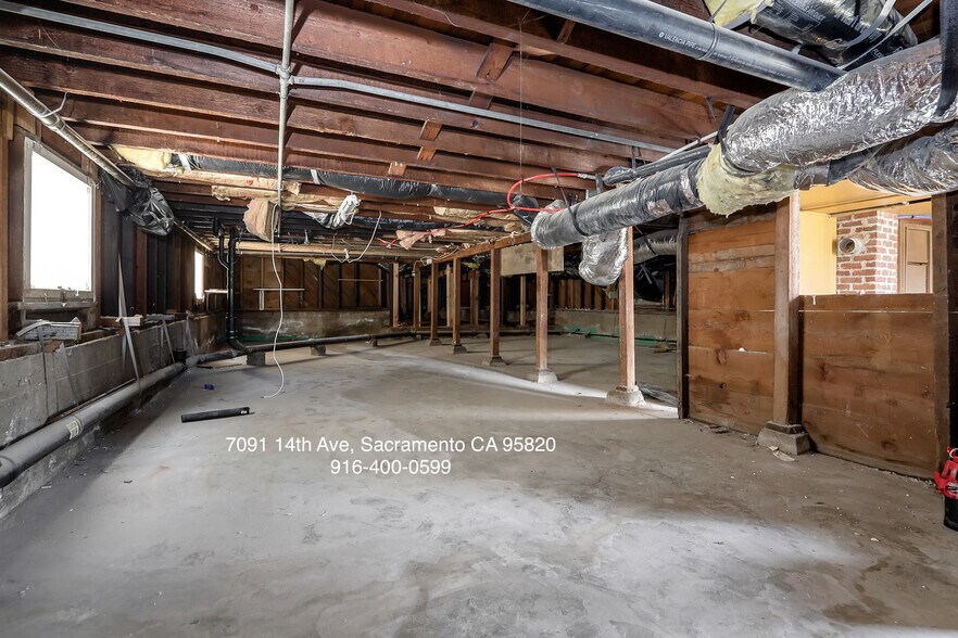 Building Photo - 7091 14th Ave