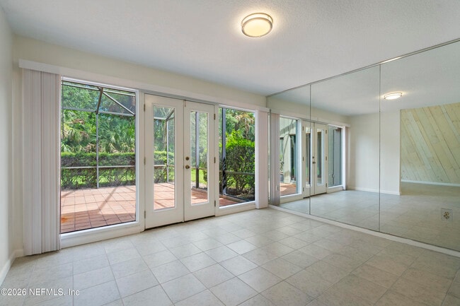 Building Photo - 9787 Sawgrass Dr E