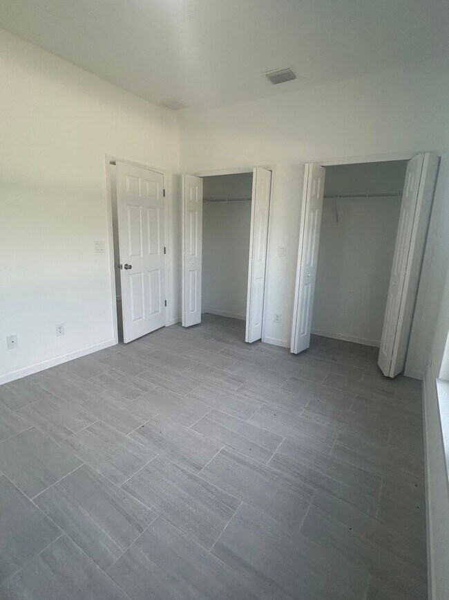 Building Photo - Brand-New Modern 2BR/2BA Home with Garage – Desirable Lake Placid Location