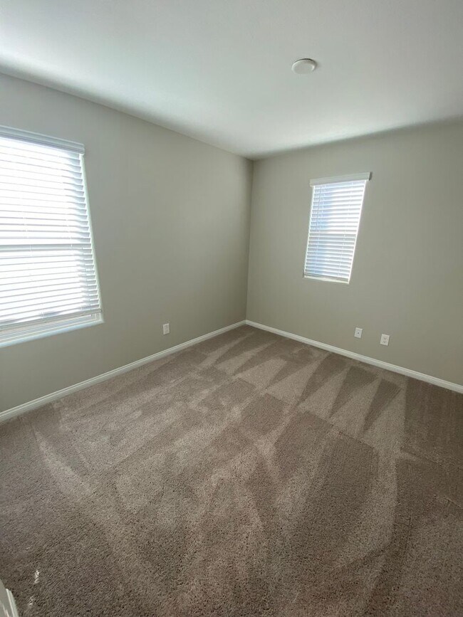 Building Photo - Americana Property Mgmt - 2022 built 4 bedrooms in prime South West Las Vegas