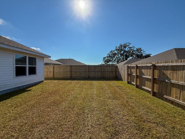 Building Photo - Updated 4 Bedroom 2 Bath Rental Near Navy Federal - Lawn Care Included!
