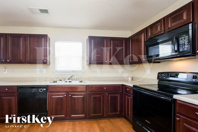 Building Photo - 3166 Redwood Run