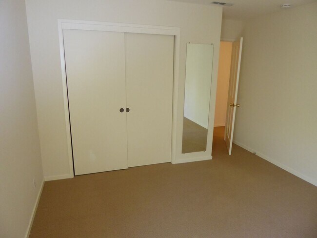 Building Photo - SPACIOUS FOUR BEDROOM / THREE AND HALF BAT...