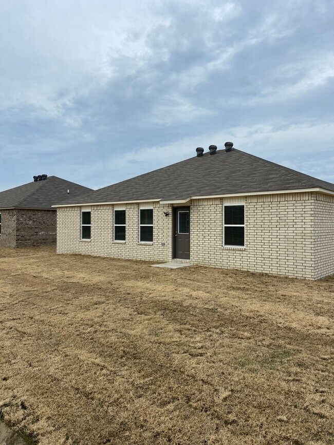 Building Photo - Now Available — Spacious 4-Bedroom, 2-Bath Home at Conrad Court | Lease Today