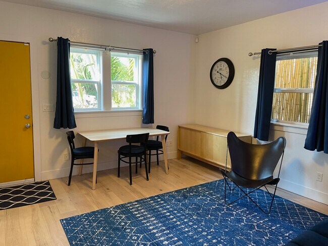 Main living area adjacent to the kitchen. - 1038 Pardee St