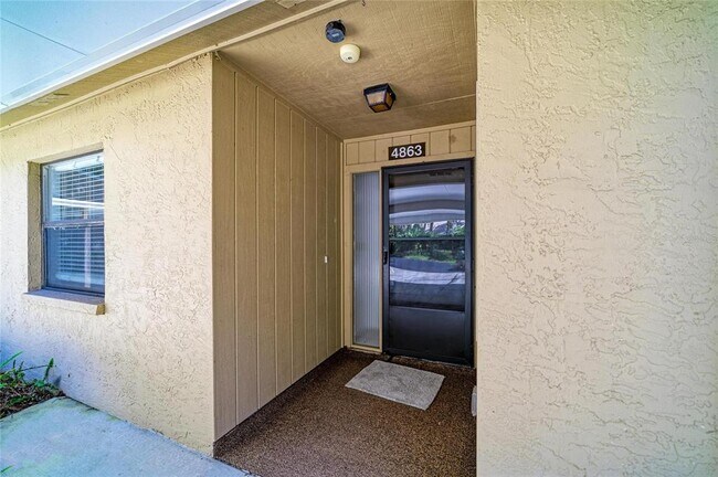 Building Photo - 4863 Village Garden Dr