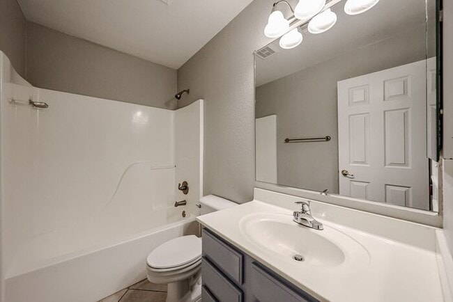 Building Photo - Introducing a stunning 4-bedroom, 2.5-bath...