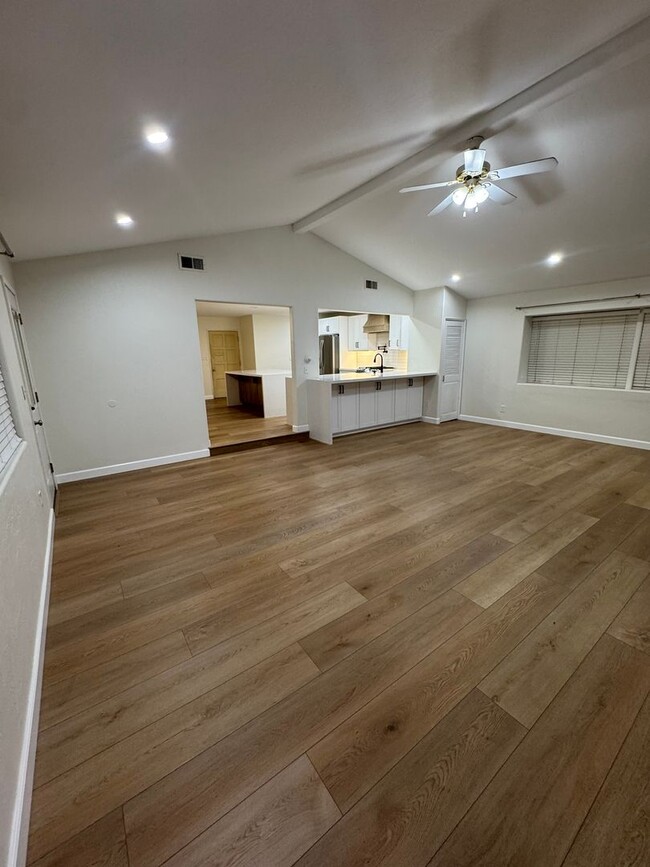 Building Photo - Beautifully Remodeled Home With Front & Si...