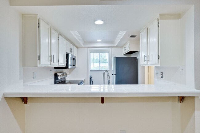 Building Photo - Hidden Silicon Valley Oasis! 2BR/2.5BA Townhome with TWO Private Patios, 2 Dedicated Parking Spac...