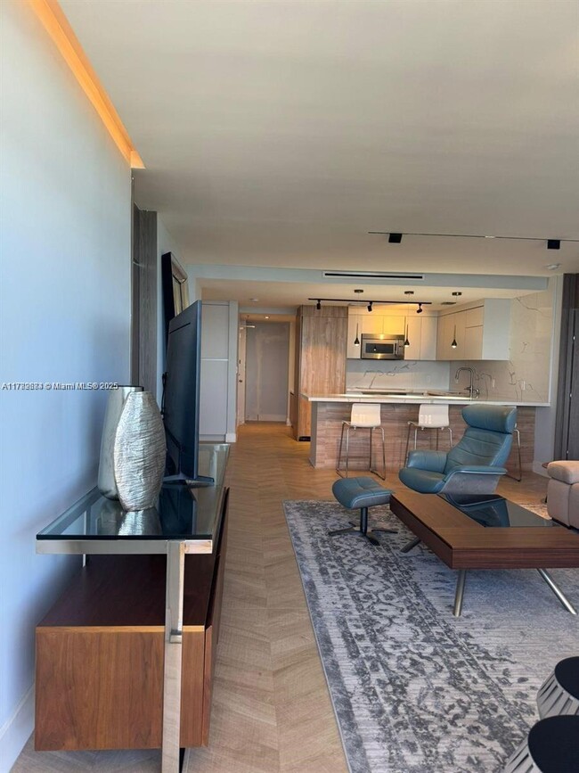 Building Photo - 10185 Collins Ave