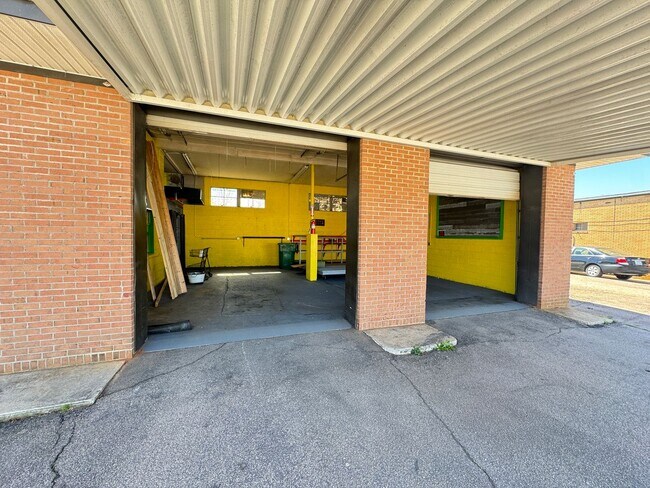 Building Photo - Prime Commercial Space for Rent in Downtown Granite Quarry - 1,323 Sq Ft with Bay Doors