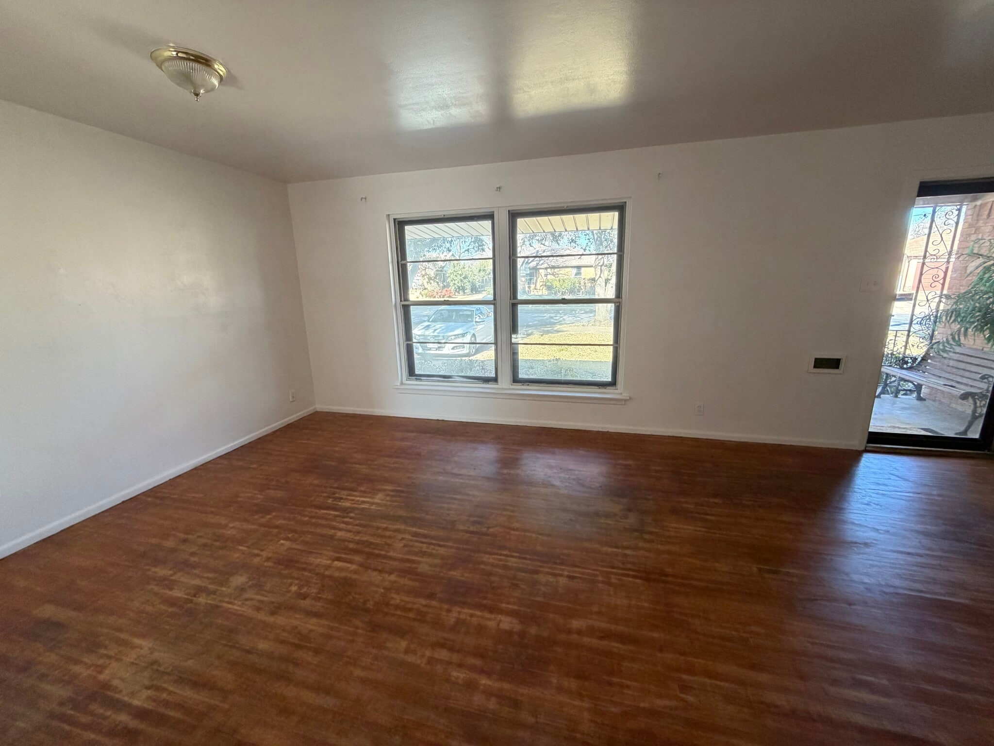 Living room looking out to your beautiful front yard! - 1848 Swan Dr