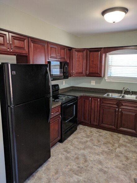 Building Photo - 6423 Powell Pl