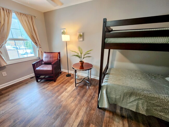 Upstairs bedroom with a bunk bed, blackout curtains, and full en-suite bathroom. (or 2 twin beds) - 34 Shenandoah Dr