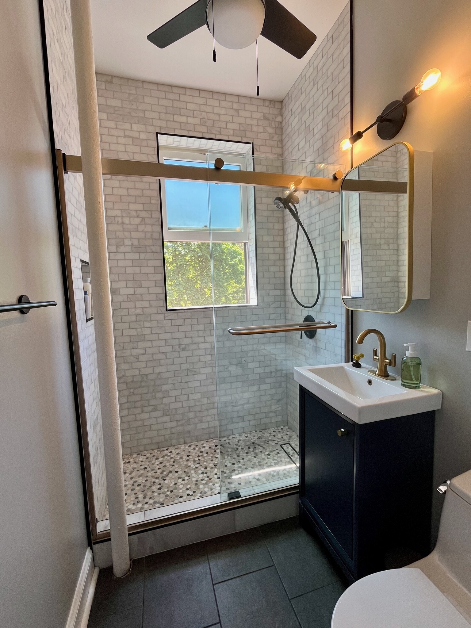 The second bathroom has been recently updated with a walk-in shower and all new fixtures. - 5142 S Greenwood Ave