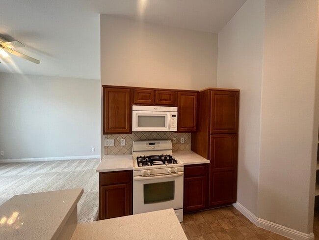 Building Photo - 2 story 2 bedroom - 2 bath - 1 car attached garage - 1182 sq feet -  in gated community.