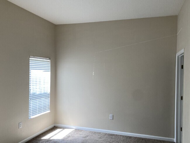 Building Photo - First-Floor 2BR/2BA Condo in Gated Nature’s Hideaway – Pool, Playground & Convenient Westside Loc...