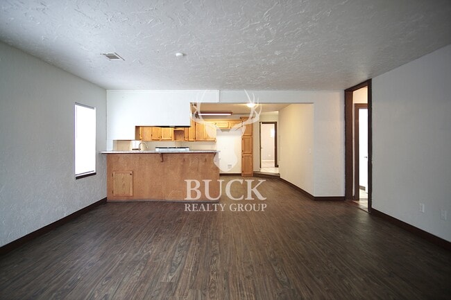 Building Photo - 211 E Harmon Dr