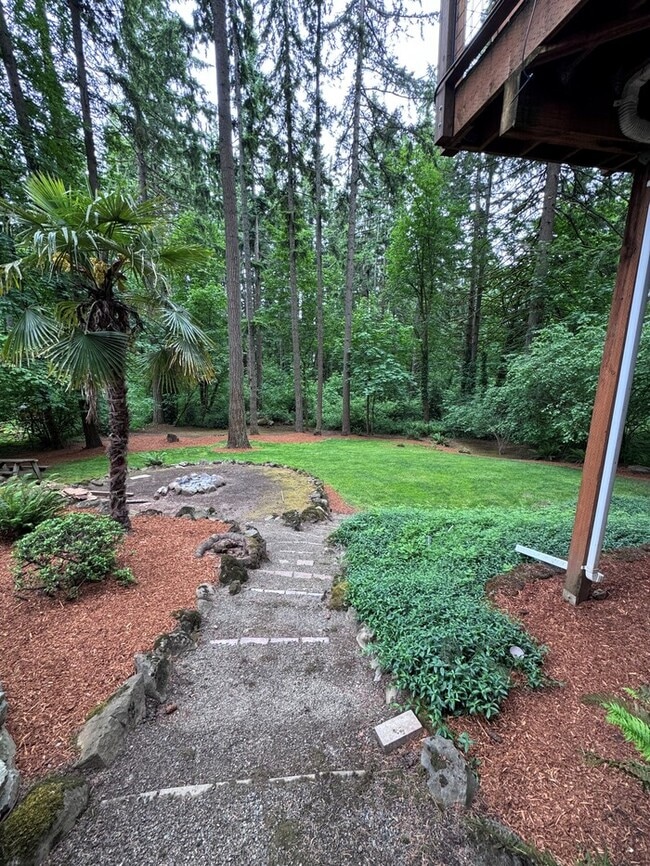 Building Photo - Spacious 4 Bed Home Backing to Private Woodland Trails! Finished Basement, Large Deck, Office, Pe...