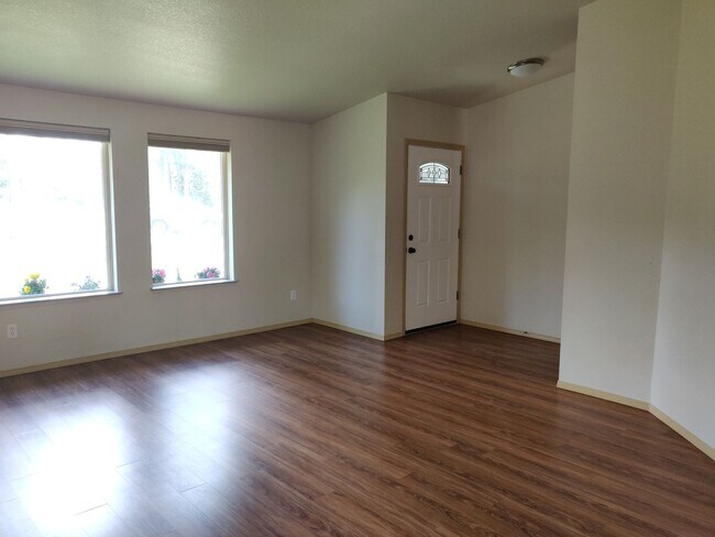Building Photo - Charming 4-Bedroom Home on 1/2 Acre with a Fenced Backyard, Fully Insulated Double-Car Garage, in...