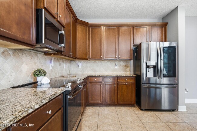 Building Photo - 4483 Plantation Oaks Blvd