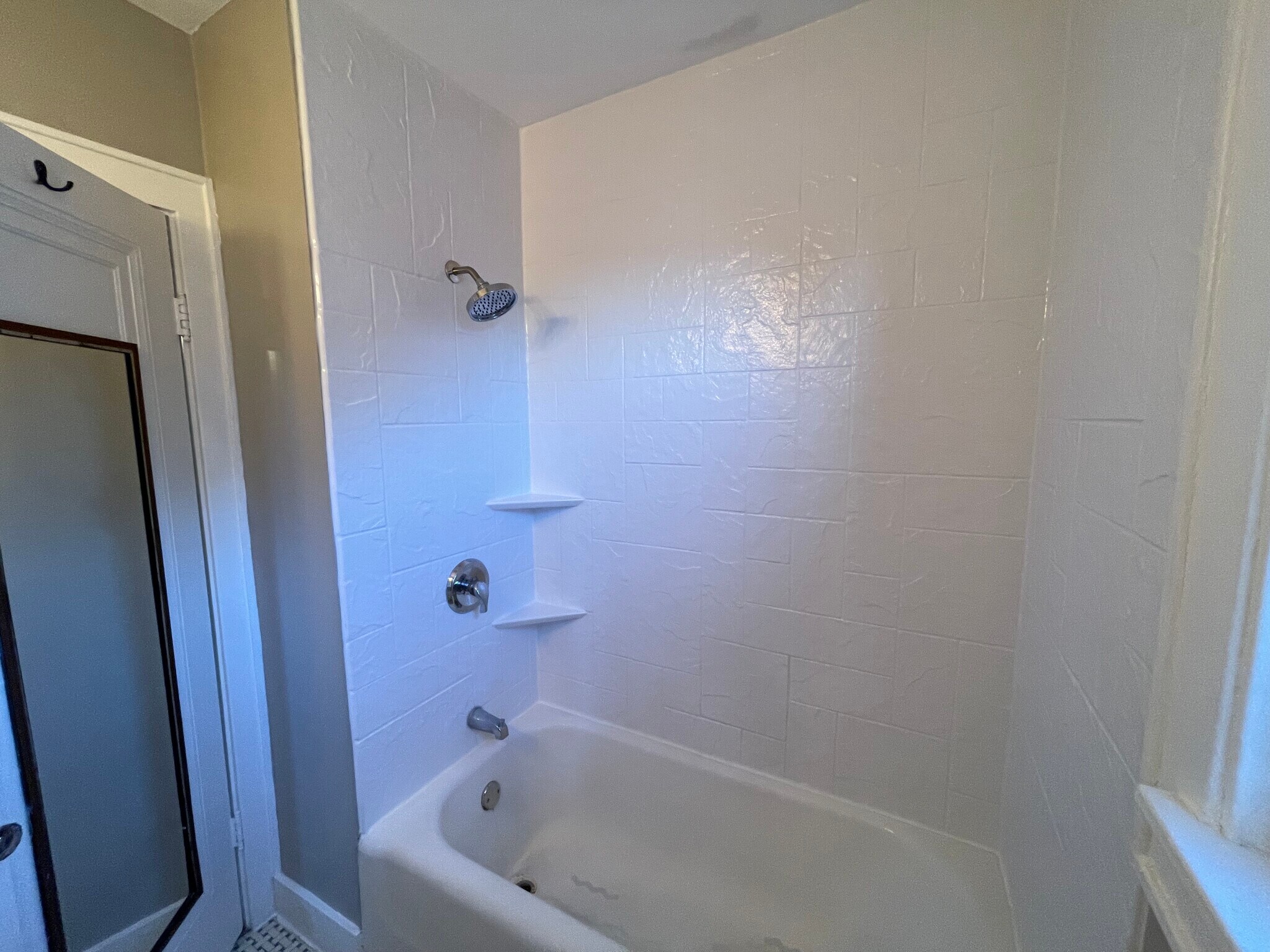 New tub surround - 3028 S 47th St