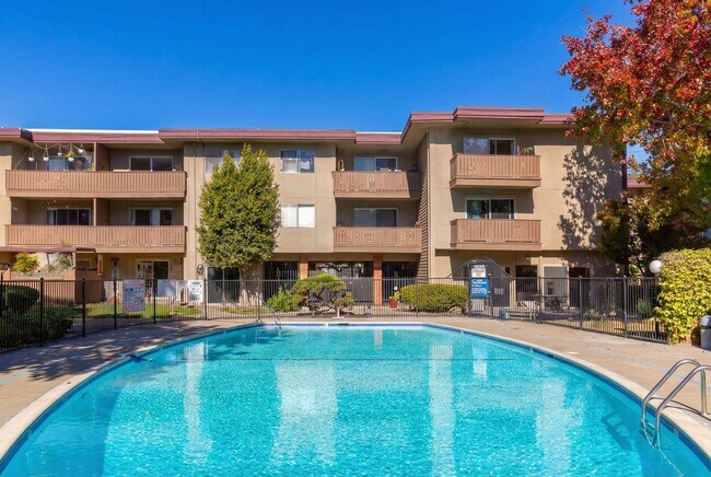 Building Photo - Modern 2-Bedroom Condo with Pool and Koi Pond Views