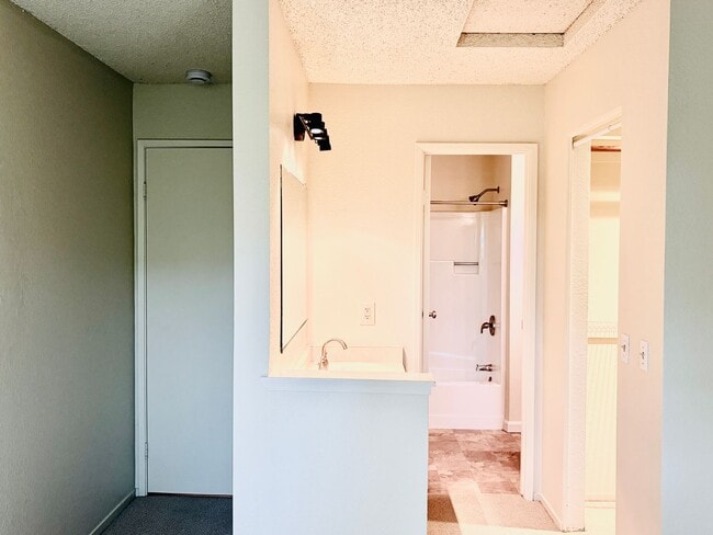 Building Photo - House like 2bed/1.5 Bath Condo with Spacious Corner Yard and 2 Car Garage