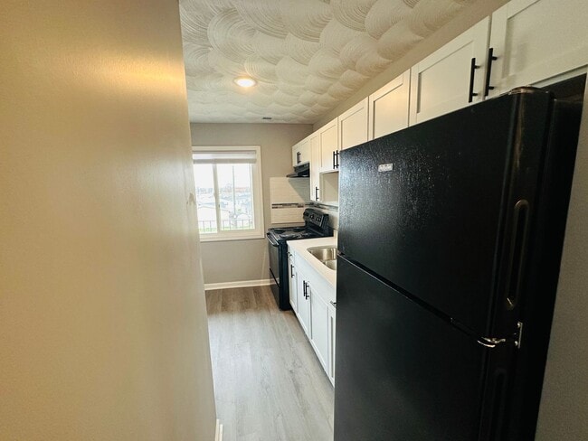 Building Photo - Experience Luxury Living at Bellagio Livin...