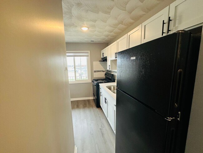 Building Photo - Experience Luxury Living at Park Harrison:...