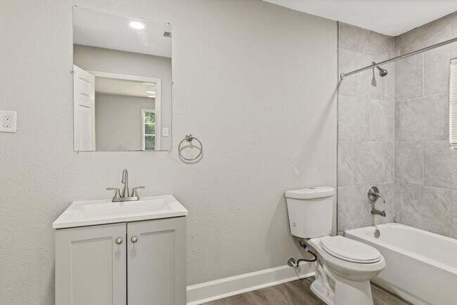 Building Photo - 3 bedroom - 2 bath. New paint, new plumbing and lighting fixtures, new bath vanities, new floorin...