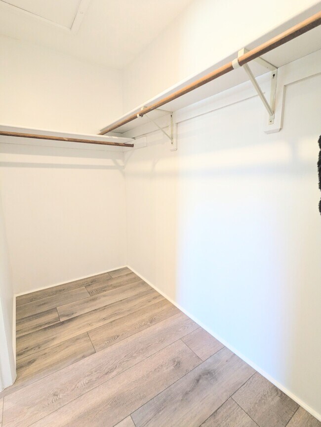 Second Bedroom Walk-in Wrap Around Closet - 9 Willowick Dr